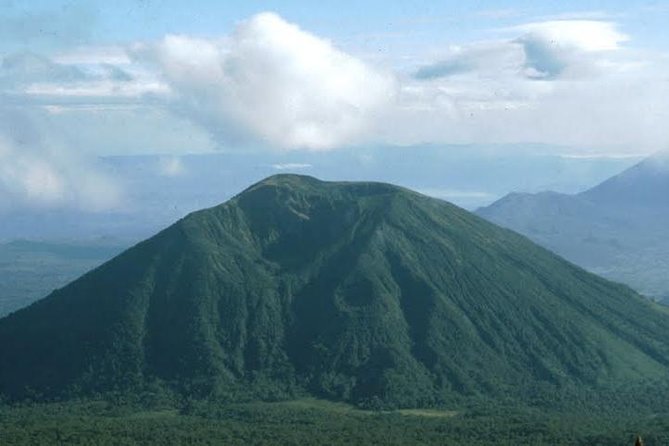 1-Day Bisoke Volcano Hiking Experience - The guide and support on the trail