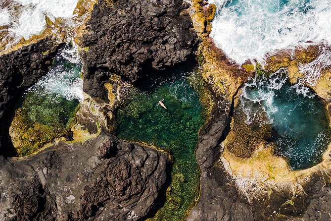 All West, Sete Cidades, Mosteiros, Ferraria - Private Tour - Mosteiros brings village life, black sand, and natural pools