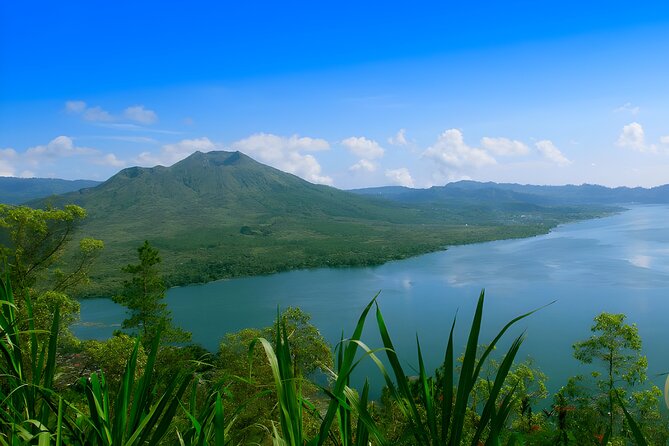 Bali Full-Day Car Charter: Ubud and Kintamani Volcano Trip - Tegenungan Waterfall starts the day with a short walk and a big view