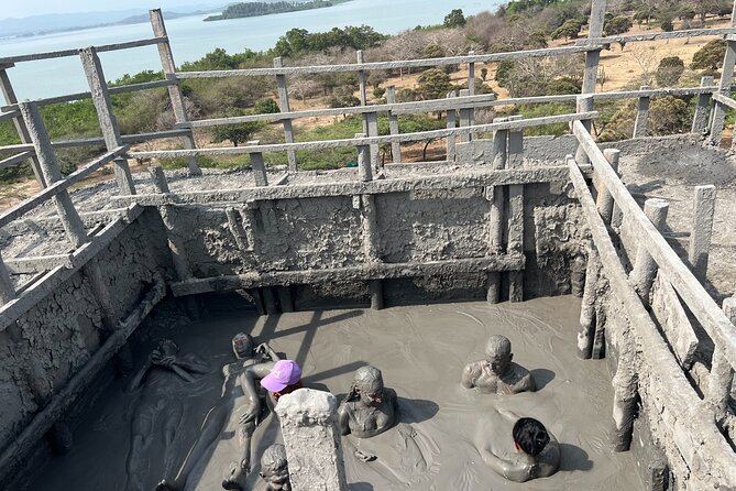 Cartagena Mud Volcano Tour — VIP Exclusive Crowd-Free Access! - Floating in warm volcanic mud