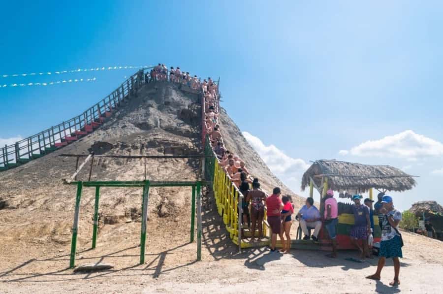 Cartagena: Mud Volcano Tour with Lunch, Pool, and Beach - Entering the mud without losing your valuables