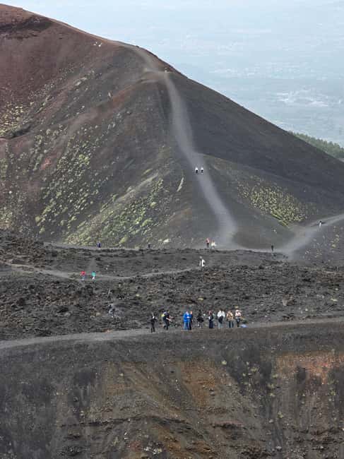 Catania: Morning tour of Etna with a visit to the Valle del Bove - Walking the Silvestri Craters at 2,000 meters