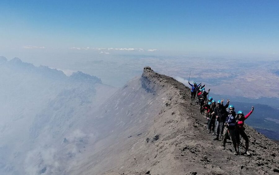 Etna: summit craters trekking with volcano guide 3350mt - Descending past the Barbagallo craters