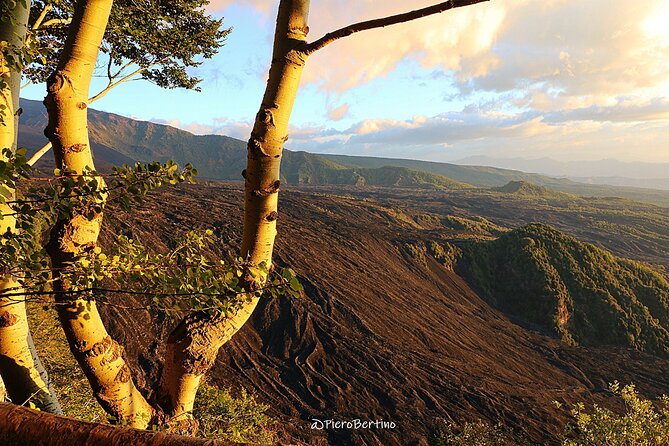 Etna Sunset Tour - Inside a lava cave with supplied equipment