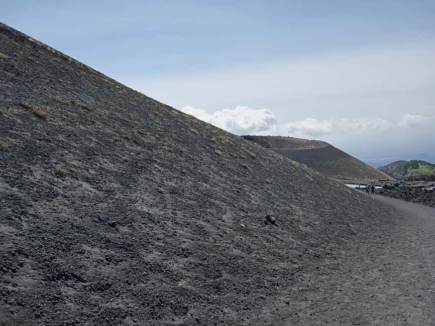 Etna walking tour, visit of a lava tunnel, Arancino tasting - Arancino, pizza, cartocciata, and dry pastries