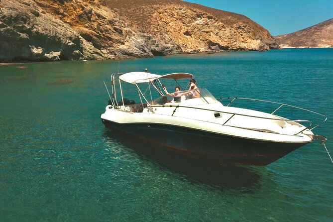 Explore Santorini and its volcanic wonders with Alex Private Boat - Greek food served after the swimming