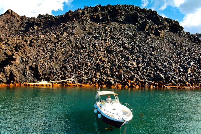 Explore Santorini and its volcanic wonders with Alex Private Boat - Friendly captains and useful local guidance