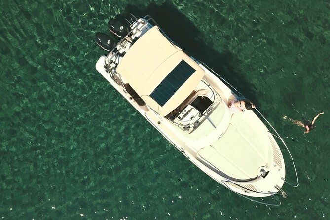 Explore Santorini and its volcanic wonders with Alex Private Boat - Nea Kameni and the volcanic heart of Santorini