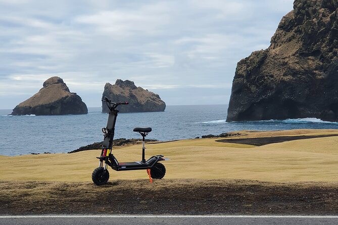 Eyjascooter volcano tour in Westman Island - Riding through town and into the open scenery
