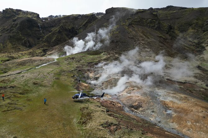 Fire and Ice Helicopter Tour: Glacier and Hengill Geothermal Area - The return flight over Reykjavik and volcanic ground