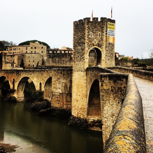 From Barcelona: Medieval Villages and Volcanic Hiking Tour - Sant Joan les Fonts brings the past down to street level