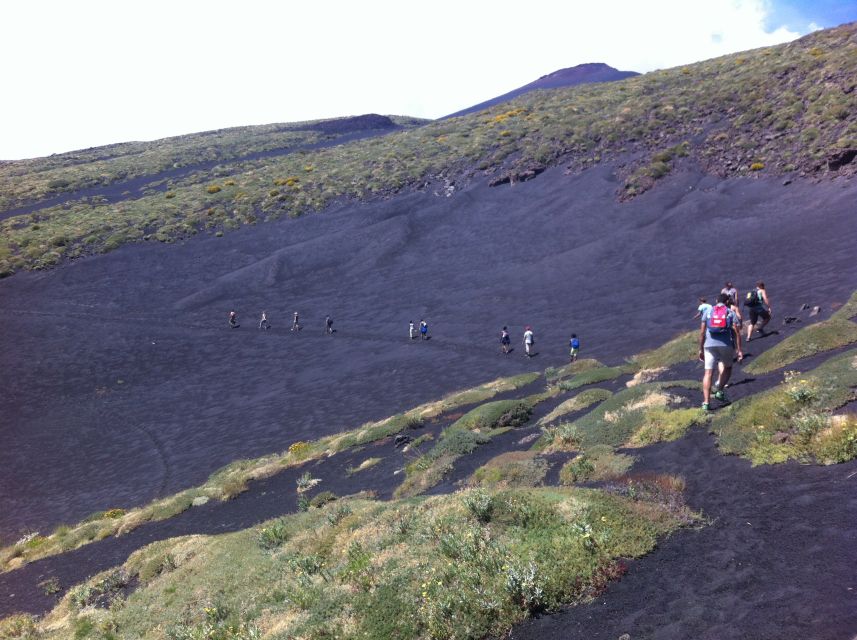 From Catania: Mount Etna Half-Day Tour and Wine Experience - The lava cave, helmets, and torches