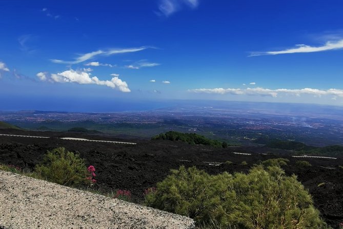 From Catania: Private mt. Etna trekking and pic-nic - Grotta di Serracozzo with helmets and torches
