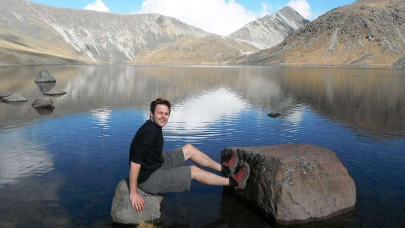 From Mexico City: Full Day Volcano Crater and Lake Hike - Entering the crater beside the alpine refuge