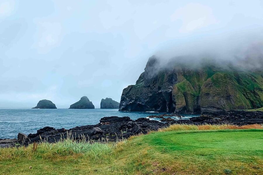 From Reykjavik: Puffin and Volcano Tour in Westman Islands - Skansinn, the Viking church, and harbor views