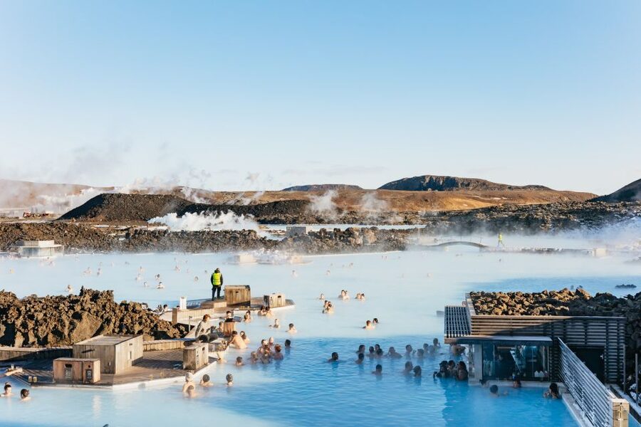 From Reykjavík: Volcanoes and Blue Lagoon Day Trip - Kleifarvatn: black sand beside a mountain lake