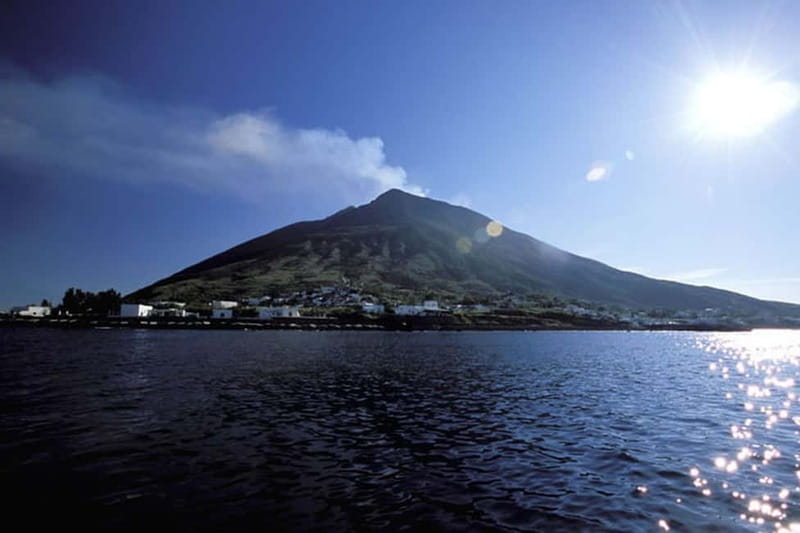 From Tropea: Panarea Island and Stromboli Volcano by Night - Panarea: blue water and a Bronze Age settlement