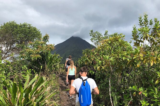 Full Day Tour with Safari Float, Waterfall and Volcano Hike - Walking the old lava trails near Arenal Volcano
