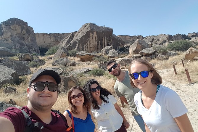 Gobustan Tour and Mad Volcanoes - tour to stone age - Reading the rock engravings at Gobustan