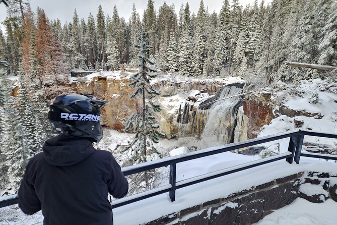 Guided Snowmobile Tours In The National Volcanic Monument - Paulina Falls in its snowy setting
