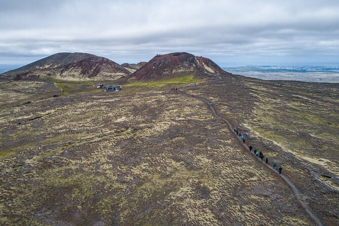 Inside the Volcano: Small-Group Tour and Lava Field Hike - Safety gear and the open cable elevator