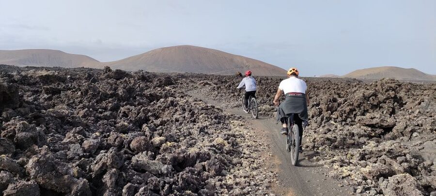 Lanzarote: Guided ebike tours of the Timanfaya volcanoes - Riding from vineyards into volcanic country