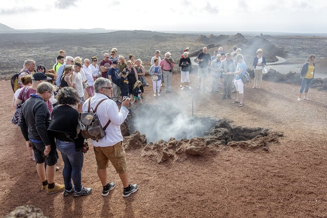 Lanzarote Volcano Half Day Tour with BBQ - Live music keeps dinner from feeling rushed