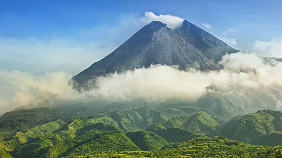 Merapi volcano sunrise with 4wd jeep and step on cold lava - Crossing a river fed by Merapi’s mountains