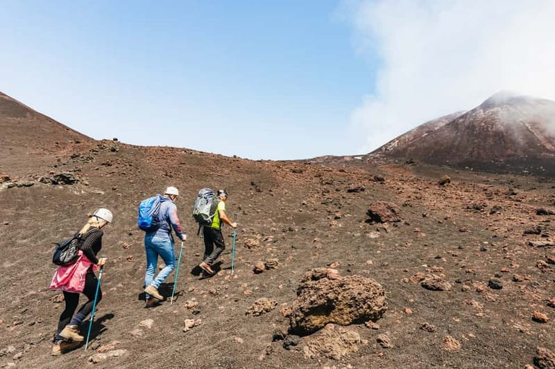 Mount Etna: scenic Summit Trek with a volcano Guide and Gear - Descending past recent eruption craters