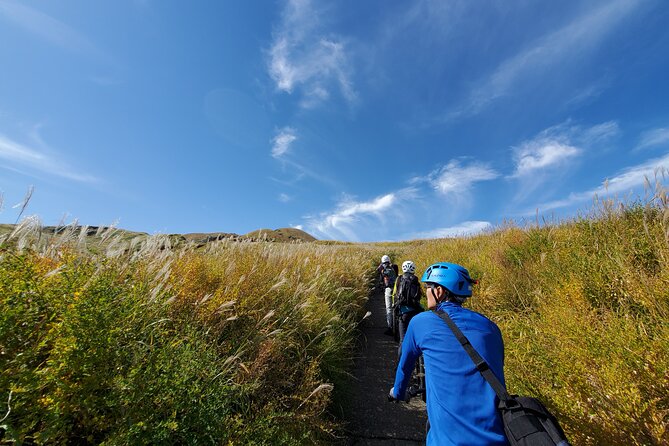 Private E-MTB guided cycling around Mt. Aso volcano & grasslands - Who will enjoy this ride most