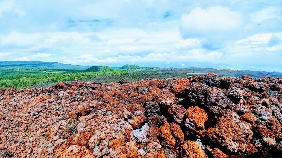 Private tour Etna and Alcantara Gorges - Entering a volcanic cave after the trek
