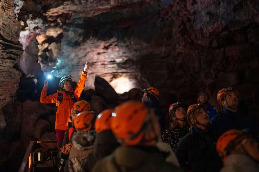 Reykjavik: Evening Lava Tunnel and Northern Lights Hunt - Entering Raufarhólshellir by head torch
