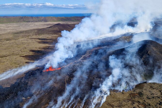 Reykjavik Helicopter Private Tour of Volcanoes - Sea cliffs, rock formations, and the Atlantic