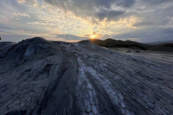 Salt Mine and Muddy Volcanoes - A Private Tour from Bucharest - Watching the earth bubble at the Muddy Volcanoes