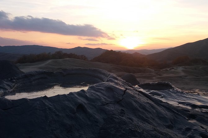 Salt Mine, the Muddy Volcanoes and Wine Tasting Private Day Tour from Bucharest! - The strange, bubbling ground at Berca