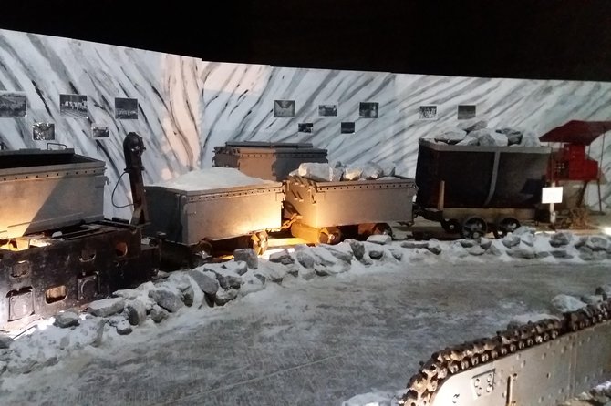 Salt Mine, the Muddy Volcanoes and Wine Tasting Private Day Tour from Bucharest! - Going 208 meters below ground at Unirea Salt Mine