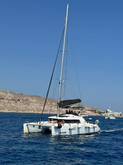 Santorini:Cruises with Catamaran around the Volcanic Island. - Thermal Springs Between the Kameni Islands