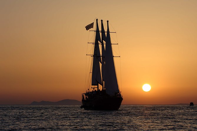 Santorini Volcanic Sunset Cruise - Setting out from Athinios Port