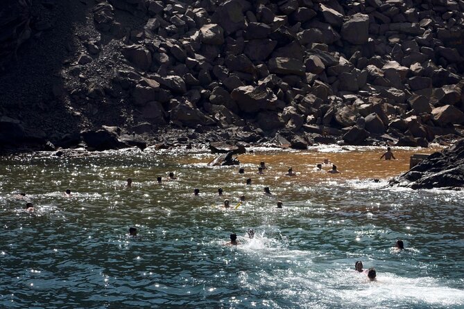Santorini - Volcano and Hot springs - Swimming to the warm water at Palaia Kameni