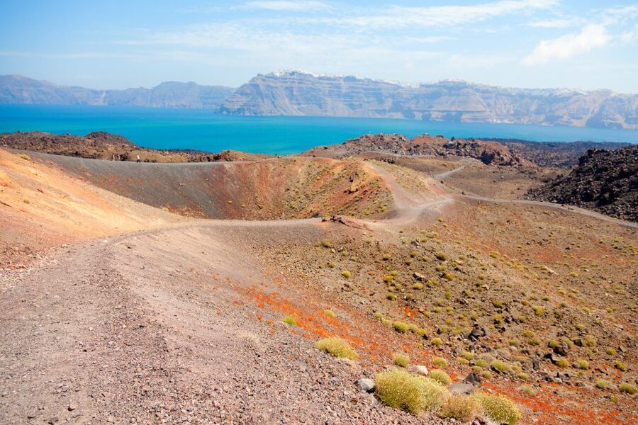 Santorini: Volcano and Hot Springs Sunset Dinner Cruise - Thirassia and the open-water pause