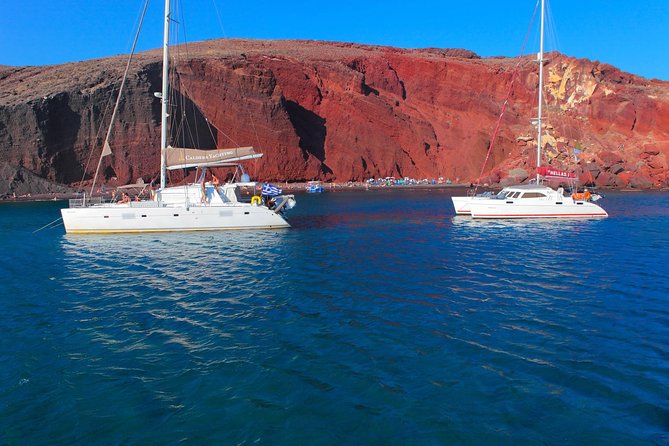 Shared Catamaran Romantic Sunset Cruise from Santorini via Volcano - Greek food, Santorinian wine, and an onboard barbecue