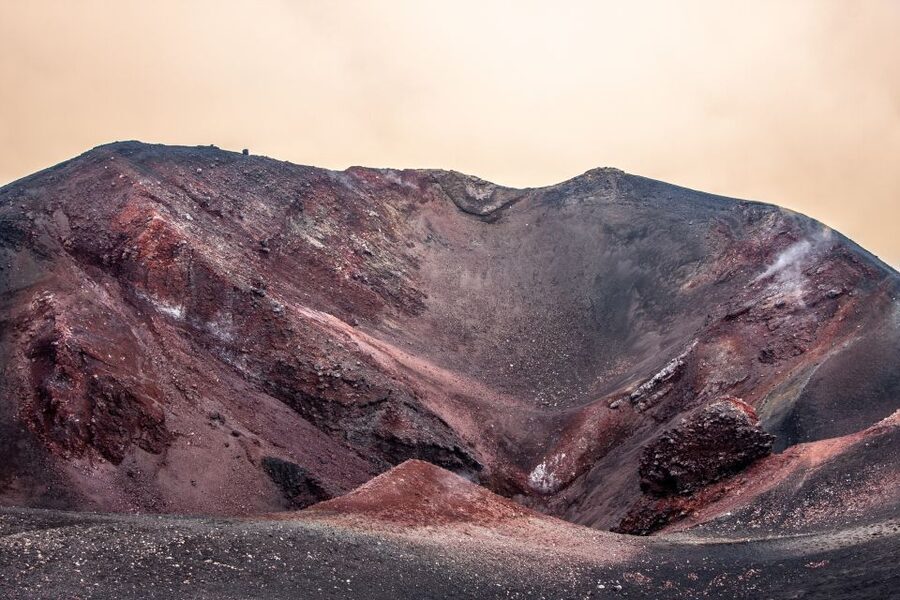 Taormina: Mount Etna Sunset Tour with Cave Visit and Tasting - Walking the craters near Rifugio Sapienza