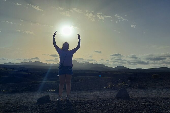 Trekking in the Volcanoes Natural Park in a small group - A sunset, a crater pause, and local snacks
